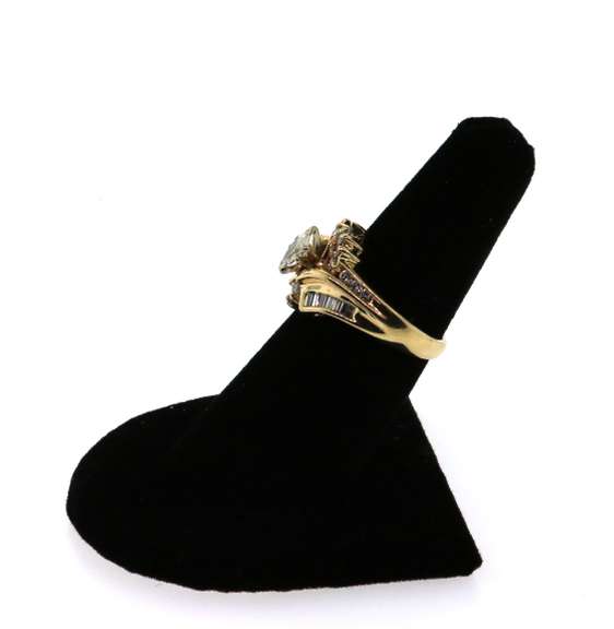 Dynamic 14k Gold Halo Diamond Ring with Baguette Diamonds