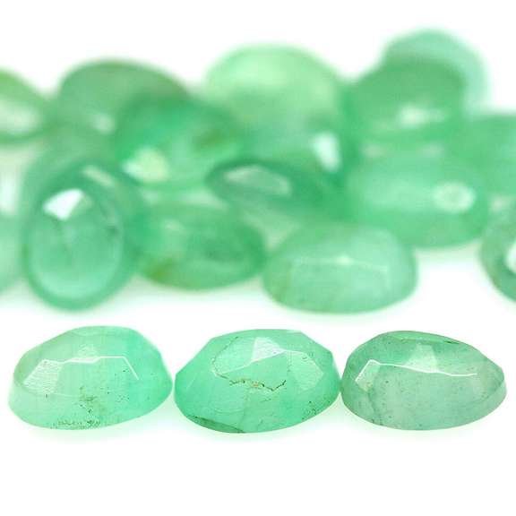 Oval cut 7.05ct Zambian Emerald set