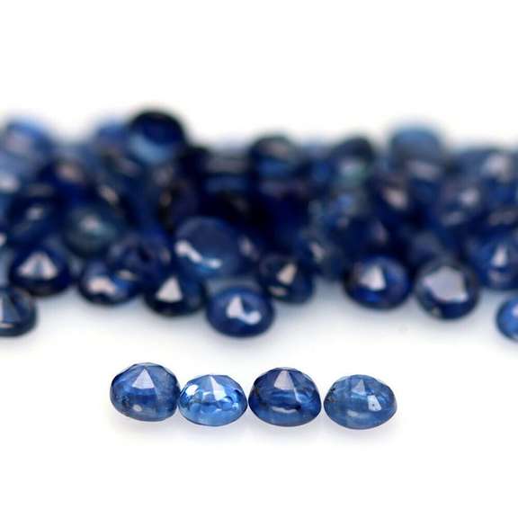 Natural 6.18ct ink blue Sapphire set