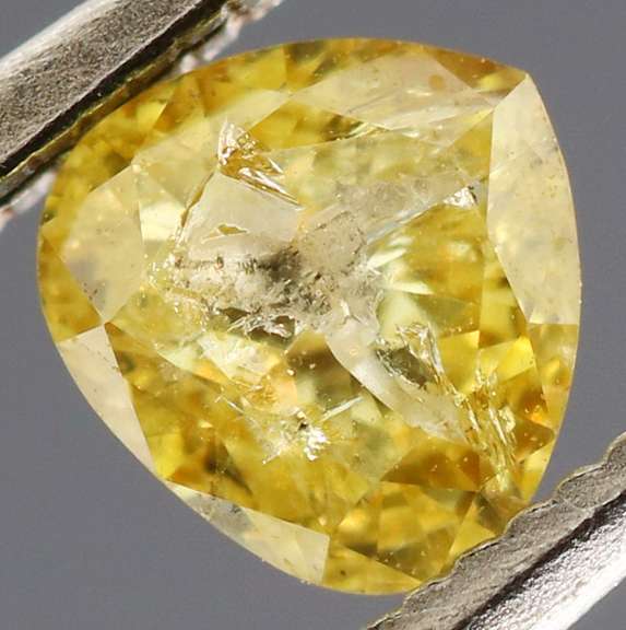 Rare .43ct pear cut canary yellow Diamond
