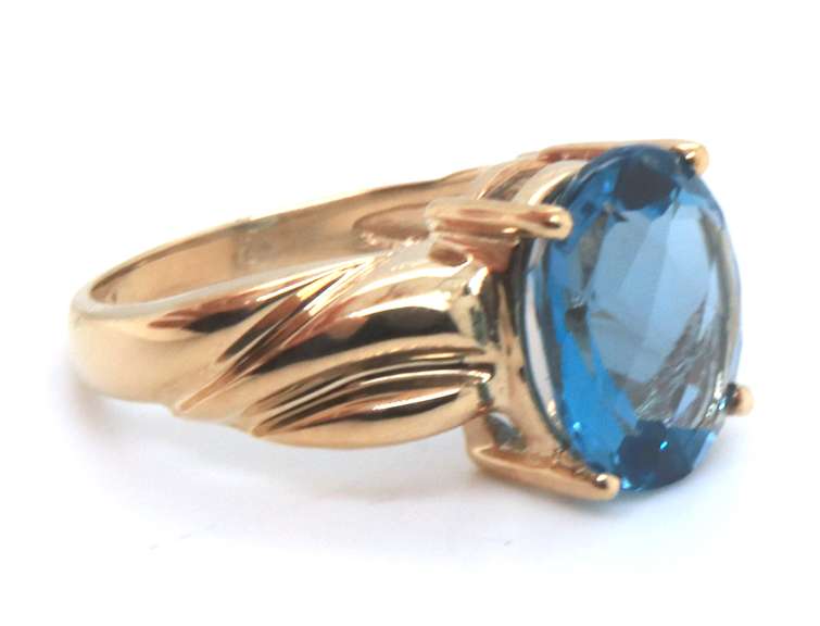 Eye Catching Blue Topaz Solitaire Ring