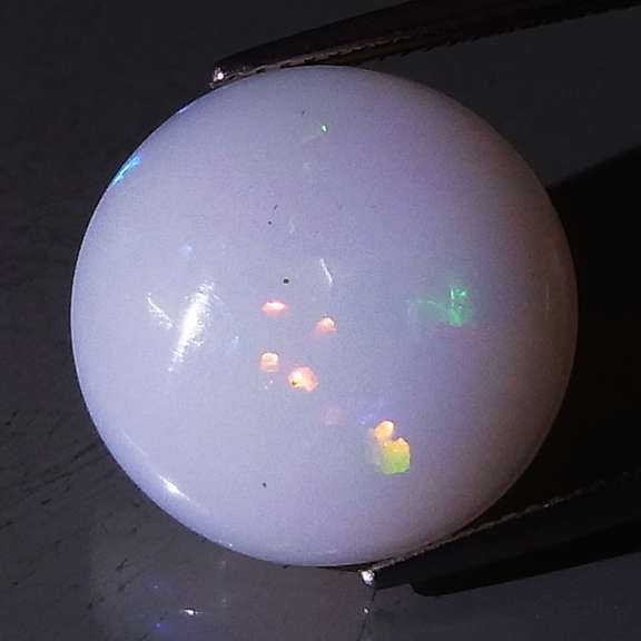 Magnificent 9.37ct disco flashing Welo Opal
