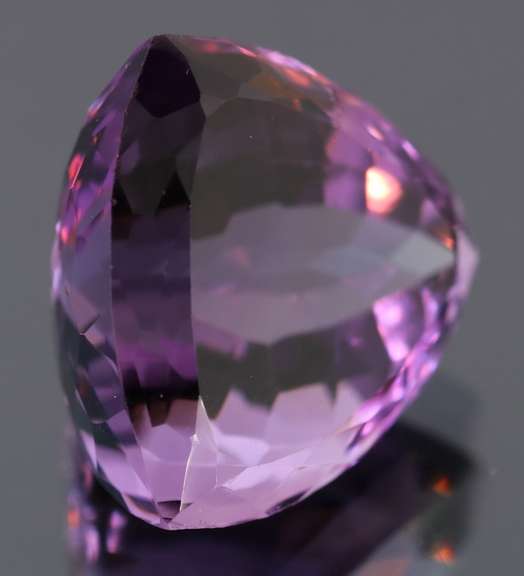 Glittering 13.06ct trillion cut Bolivian Amethyst