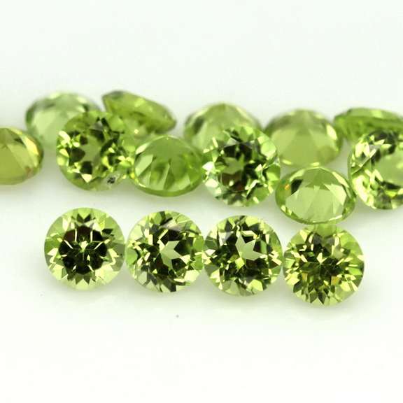 Dazzling 4.97ct untreated apple green Peridot set