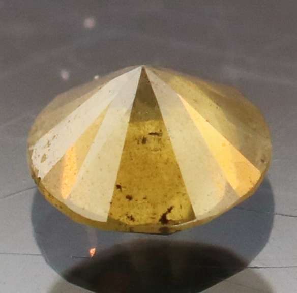 Eye catching 0.41ct golden orange Diamond solitaire