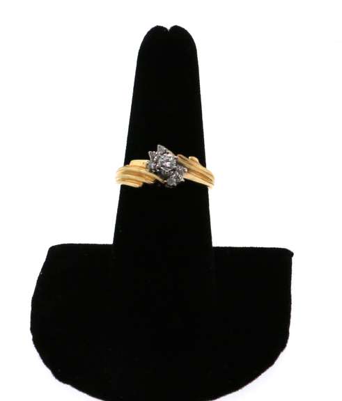 Graceful Centerpiece Round Diamond Ring encircled by stepped Diamonds on a 14k Gold Band