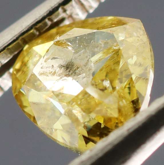 Rare .43ct pear cut canary yellow Diamond