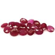 Vibrant 7.04ct oval cut imperial red Ruby set