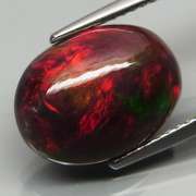 Smoldering flashing 2.98ct Welo Black Opal