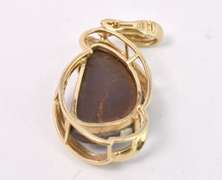 Luxurious Opal Pendant in 14K Yellow Gold
