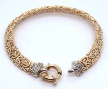 Dynamic Yellow Gold Byzantine Bracelet with Diamond accents