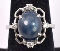 Darling 7.01CTS Cabochon-Cut Star Sapphire and 0.17CTW Diamond Ring in Sterling Silver