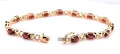 Attractive 7ctw Oval Garnet Yellow Gold Bracelet