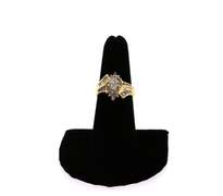 Dynamic 14k Gold Halo Diamond Ring with Baguette Diamonds