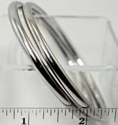 Classically Simple 18K White Gold Pair of Tiffany Bangles