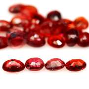 Excellent 6.22ct set of oval cut red Imperial Sapphires