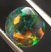 Vibrant 1.64ct Welo black Opal solitaire