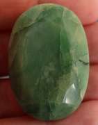 Heavy 162 oval cut forest green Emerald