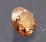 Eye catching 0.22ct smooth cut red Diamond solitaire