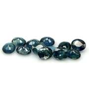 Heated only! 9.09ct blue green Sapphire set