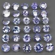 Heavy flashing 5.39ct diamond cut Tanzanite set
