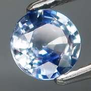 Heated only! 0.77ct bi-color calico Ceylon Sapphire solitaire