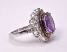 Magnificent Large Amethyst Set in Sterling Silver Ring with Diamond Accents.