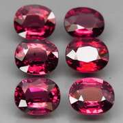 Amazing 6.61ct oval cut violet pink Garnet set