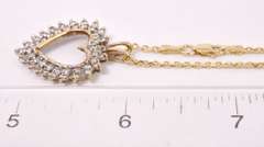 Stunning Diamond Heart Pendant Necklace in Yellow Gold