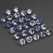 Heavy flashing 5.58ct diamond cut Tanzanite set