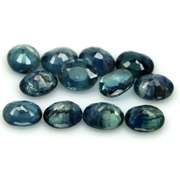 Heated only! 9.09ct blue green Sapphire set