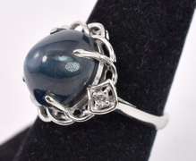 Wonderful 11.11CTS Star Sapphire and 0.08CTW Diamond Ring in Sterling Silver