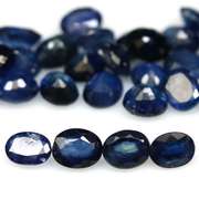 Stunning ink blue 8.64ct oval Sapphire set