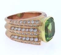 Powerful 18kt Cushion Cut Peridot and Diamond Ring