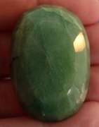 Heavy 162 oval cut forest green Emerald