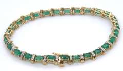 Stunning Oval Emerald and Diamond Ribbon Link Bracelet