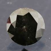Very fine .32ct smooth cut Black Diamond solitaire