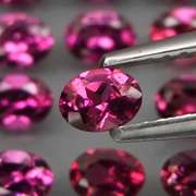 Ravishing 5.55ct violet pink Rhodolite Garnet set