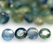 Heated only! 7.68ct blue green Sapphire set
