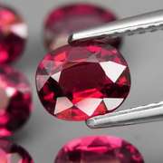 Amazing 6.61ct oval cut violet pink Garnet set