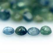 Heated only! 7.68ct blue green Sapphire set