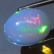 Glowing! 3.07ct rolling floral pattern Jelly Opal