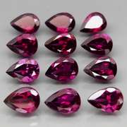 Amazing 9.54ct pear cut purple Garnet set