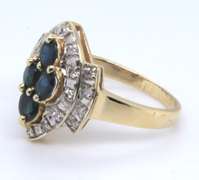Charming Yellow Gold Marquise Shaped Blue Sapphire and Diamond Ring