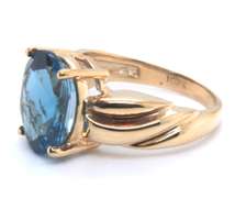 Eye Catching Blue Topaz Solitaire Ring