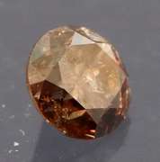 Eye catching 0.22ct smooth cut red Diamond solitaire