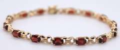Attractive 7ctw Oval Garnet Yellow Gold Bracelet