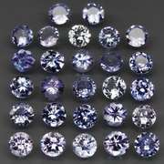 Heavy flashing 5.58ct diamond cut Tanzanite set