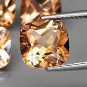 Gorgeous cushion cut 14.97ct Imperial Topaz set