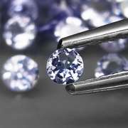 Glittering 4.86ct bright blue violet Tanzanite set